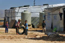 Lebanon tightens security around refugee camp over virus
