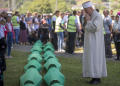 Bosnian Muslims mark 1995 massacre of thousands with burials