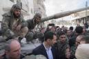 Syrian President Assad visits troops on Ghouta's front line