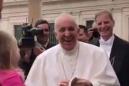 Over-excited little girl steals the Pope's hat off his head