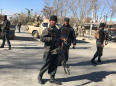 Suicide bombers kill dozens at Shi'ite center in Afghan capital
