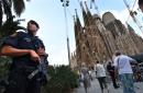 Police uncover gas arsenal at bomb factory as Barcelona mourns