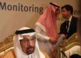 Saudi says to cut oil output as producers discuss price dip