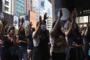 Thousands protest mask ban as HK leader toughens stance