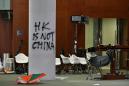 Hong Kong police vow action over parliament storming