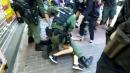 Hong Kong protests: Police tackle 12-year-old girl to the ground