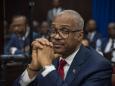 Haitian prime minister Jack Guy Lafontant resigns after fuel price hike triggers deadly riots