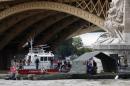 Danube currents keep rescuers from wreck after deadly river crash