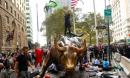 Extinction Rebellion protesters pour fake blood over New York's capitalist bull