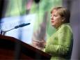 German audience cheers as US commerce secretary speech is cut off