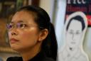 Wife of detained Taiwanese activist arrives in China