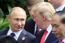 Trump, again on defensive, says Putin denies 2016 meddling