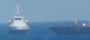 U.S. Navy ship fires warning shots near Iranian vessel
