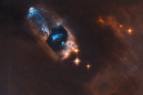 NASA posts image of ghostly blue objects, deep in the cosmos