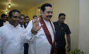 Rajapaksa set to quit as Sri Lanka's premier to end crisis