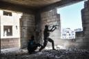 Losing Syria bastion, IS lashes out behind front lines