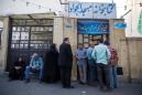 Iran counts votes after big turnout in presidential election