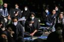 Iran says virus deaths close to 7,000