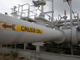 Oil climbs on Venezuelan crisis despite surging U.S. supply