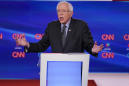 The Latest: Sanders, Biden debate Social Security backing