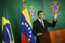 Facing Jail in Caracas, Guaido Travels Across South America