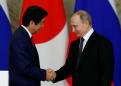 Russia's Putin, Japan's Abe call for talks, calm with North Korea
