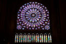 Notre-Dame's famed rose window spared but blaze harms priceless artworks