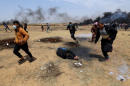 Israeli forces kill three Gaza border protesters, wound 600: medics