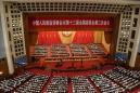 China's top political meetings open with minute silence over virus, threat to US