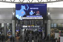 More airports screening passengers amid China virus outbreak