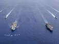 The US Navy again has 2 carrier strike groups in the South China Sea as the US and China trade jabs