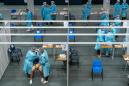 Wary Hong Kongers shun China-backed mass virus testing