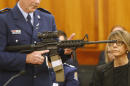 New Zealand gun owners turn over their weapons for money