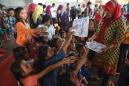 Indonesia trims tsunami death toll, hikes injury tally