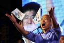 Behind in polls, Taiwan president contender tells supporters to lie to pollsters