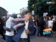 TV presenter punched live on air during protest