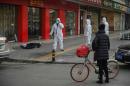 China virus toll passes 250 as travel curbs tightened