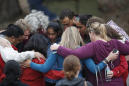 The Latest: Colorado school closes for week after shooting
