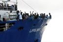 Italy to pick up migrants, impound German charity ship