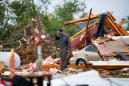 At least 33 dead as dozens of tornadoes rip through the South