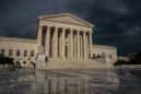 Justices seem divided over court access for asylum seekers