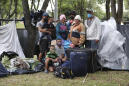 AP PHOTOS: Venezuelan migrants make long trek back home
