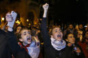 Thousands protest against new PM, close roads in Lebanon