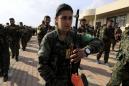 Kurdish, Arab fighters drop IS fight to defend Syria's Afrin
