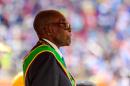 93-year-old Mugabe says 'not dying' as health concerns mount