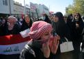 Iraqi security forces kill protester, rockets hit U.S. embassy