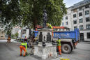 Black UK protester statue removed from pedestal in Bristol