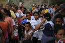 Drowned father, daughter left humble origins in El Salvador