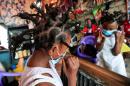 Nairobi hair salon defies pandemic with 'coronavirus' style
