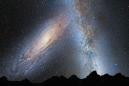 Andromeda galaxy will deliver a 'glancing blow' to our Milky Way later than expected